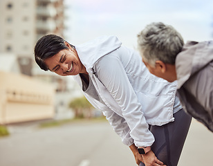 Image showing Tired, running and friends with women in city training for stamina, endurance and fitness. Workout, goal and teamwork with senior runner jogging in town for support, exercise and cardio