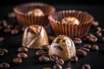 Image showing Chocolate pralines with coffee