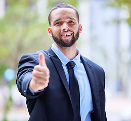 Image showing Support, thumbs up and business man in city for leadership, motivation and corporate startup. Manager, success and portrait of male entrepreneur with hand gesture for thank you, agreement and goals
