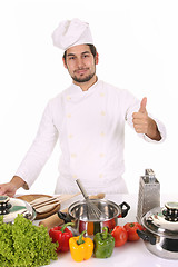 Image showing young chef preparing lunch 