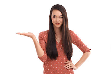 Image showing Portrait, mockup and space with a woman in studio isolated on a white background holding blank space. Marketing, mock up and product placement with a female advertising to promote a brand logo