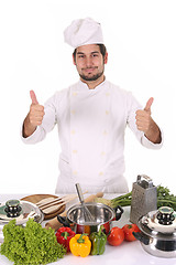 Image showing young chef preparing lunch 