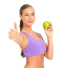 Image showing Woman, apple and studio portrait with thumbs up for nutrition, diet goal or wellness by white background. Isolated model, healthy fruit or smile for health, vitamin c or natural detox for strong body