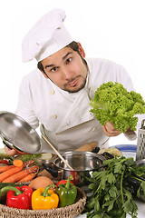 Image showing young chef preparing lunch 