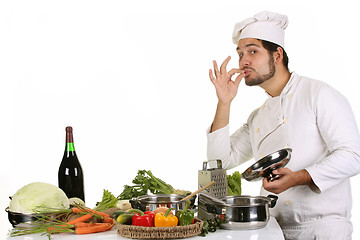 Image showing young chef preparing lunch 