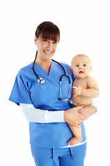 Image showing Nurse, portrait and woman with baby in studio isolated on white background. Face, healthcare and happy medical professional, physician or female pediatrician holding child, kid or toddler at hospital