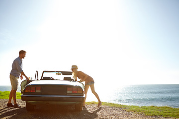 Image showing Car road trip, travel and couple on ocean sea adventure, holiday transport journey or summer vacation bond. Love flare mockup, convertible vehicle and driver driving in fun Canada countryside mock up