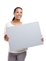 Image showing Advertising, banner and woman on a white background with poster, billboard and gray sign isolated in studio. Marketing, branding mockup and happy female model for announcement, news and information