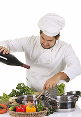 Image showing young chef preparing lunch 