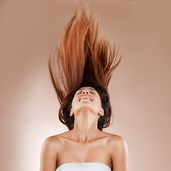 Image showing Hair care, beauty and cosmetics of a woman on studio background for luxury salon treatment with shampoo product. Headshot of aesthetic model posing for hairdresser, skincare and wellness mockup