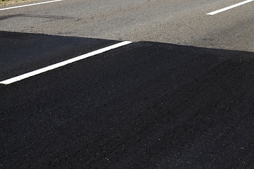 Image showing repaired part of the paved road