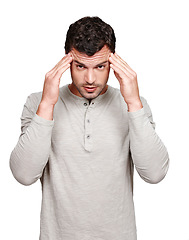 Image showing Mental health, headache and studio portrait of man with anxiety problem, burnout fatigue and depressed over mistake. Medical healthcare crisis, sad depression and model migraine on white background