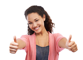 Image showing Success, face portrait and thumbs up of woman in studio on a white background. Hands gesture, like emoji and happy female model with sign for motivation, support or approval, thank you or agreement.