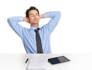 Image showing Businessman, tablet and tired rest at desk in studio for lunch break, nap or daydream after accounting planning, finance analysis or sales growth. Man, relax and sleep for fintech startup strategy