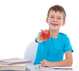 Image showing Education books, child portrait and apple for health nutrition, studio learning or school math homework. Nutritionist food, student study snack and kid boy show fruit isolated on white background