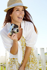 Image showing Laughing photographer, camera or travel blogger in holiday location, summer vacation or Germany sightseeing break. Smile, happy woman or vlogger with photography equipment for tourist nature review