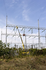 Image showing repairing high voltage power lines