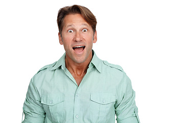 Image showing Shock, portrait and amazed man in a studio with a omg, wow and wtf facial expression. Shocked, surprised and happy male model in casual outfit with surprise or good news isolated by white background.