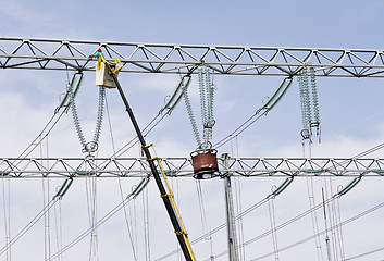 Image showing repairing high voltage power lines