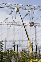 Image showing repairing high voltage power lines