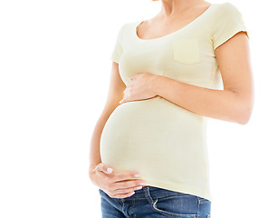 Image showing Mom, pregnancy and woman touch her stomach with care, love and loving parenting. Mother hands, motherhood and mama hand holding her abdomen to show loving protect gesture for baby with mock up