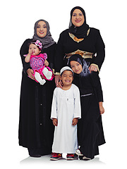 Image showing Muslim family, women and children portrait together in studio with hijab clothes for Islam religion and culture. Arab mother, grandmother and kids together for eid isolated on a white background