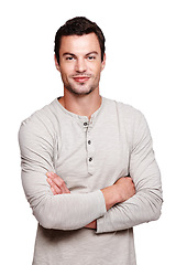 Image showing Man, smile and arms crossed with mindset or vision for happy ambition, goal or profile against white studio background. Portrait of a isolated young male smiling with crossed arms on white background