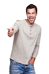 Image showing Wow, man and pointing hand in direction with excited, curious and surprise expression. Happy smile of handsome model thinking of ideas with excited focus at isolated white background.