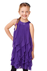 Image showing Portrait, dress and young girl with smile, fashion and kid isolated on white studio background. Female child, fancy clothing and confident with happiness, comfortable outfit and youth on backdrop