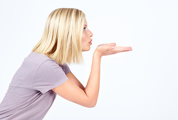 Image showing Flirting profile and air kiss of girl contemplating, thinking and thoughtful for advertising. Attractive flirt and affection of isolated model blowing kisses on white background mock up.