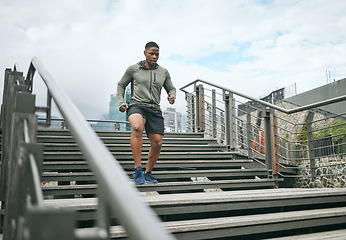 Image showing Fitness, bridge or black man running on stairs for legs training, exercise or workout in city of in Miami, Florida. Steps, runner or healthy sports athlete with wellness goals, motivation or mission