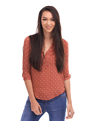 Image showing Portrait, fashion and trendy with a model woman in studio isolated on a white background for contemporary style. Happy, smile and casual with an attractive young girl posing in stylish clothes