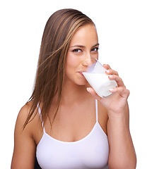 Image showing Milk, glass and portrait of woman with white background, isolated studio and healthy diet. Face of female model, dairy product and organic breakfast with protein, calcium and vitamins for wellness