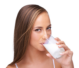 Image showing Milk drink, glass and portrait of woman with white background, isolated studio and healthy diet. Face of female model, dairy product and organic breakfast for protein, calcium or vitamins of wellness