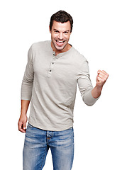 Image showing Happy man, fist and celebration for winning, discount or goal against a white studio background. Portrait of isolated male model winner with smile celebrating win, sale or achievement on mockup