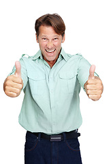 Image showing Man, thumbs up and smile in studio portrait with casual fashion, excited and yes by white background. Happy middle aged man, agreement and hand sign with success, isolated and happiness with shirt