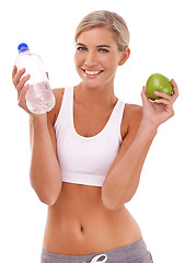 Image showing Apple, water and health portrait of woman with fruit product to lose weight, diet or body detox for wellness lifestyle. Hydration bottle, nutritionist food and fitness girl on white background studio