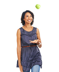 Image showing Woman, studio and throw apple in air with smile, nutrition and diet with fashion, happiness and white background. Black woman, health and natural green fruit for detox, energy or wellness by backdrop