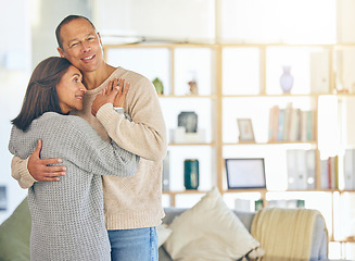 Image showing Love, romance and married with a couple hugging while standing in their home together with mockup or flare. Affection, bonding and hug with a mature man and woman embracing in their domestic house