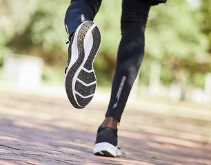 Image showing Running, shoes and fitness with black man outdoor, run for healthy lifestyle and wellness with athlete and sport. Runner with sneakers, workout and body training with sports motivation and cardio