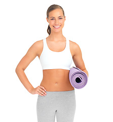 Image showing Portrait, yoga and fitness with a woman in studio isolated on a white background for a workout or exercise. Gym, training and wellness with a female athlete or yogi carrying a mat for balance