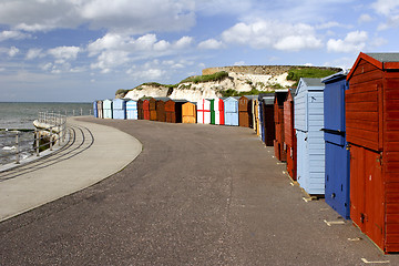 Image showing colorful seaside promenade beach huts