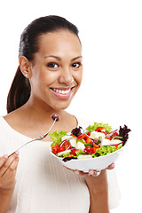 Image showing Black woman, eating vegetable salad and happy for diet nutrition, breakfast health and vegan isolated in white background studio. African girl, smile portrait and healthy food meal or lettuce lunch