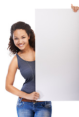 Image showing Black woman, portrait and mockup with advertising poster and smile with empty promo placard. Happy, young and optimistic girl holding poster mockup in white studio for marketing campaign.