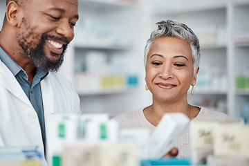 Image showing Pharmacy, medicine and senior woman consulting pharmacist on prescription. Healthcare worker, shopping and female in consultation with black man for medication box, pills or medical product in store.