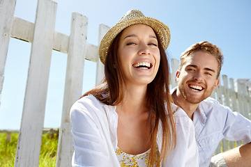 Image showing Portrait, love and date with a couple in the park during summer vacation or holiday together in nature. Spring, garden and relax with a man and woman sitting in a field for dating or bonding