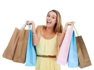 Image showing Shopping bag, portrait and woman excited in studio, isolated white background and retail mall sales. Happy customer, model and shopping in commerce market, discount promotion and luxury store brand