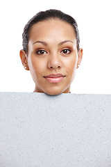 Image showing Face, portrait and woman with poster for mockup, marketing or advertising space in studio isolated on a white background. Product placement, branding and female with banner for mock up or promotion.