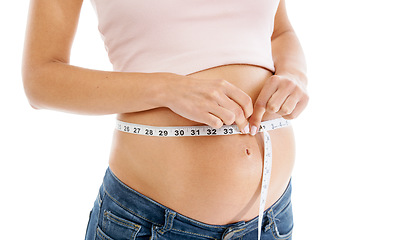 Image showing Pregnancy, measuring tape and woman stomach in studio to check growth, development and health on mockup. Abdomen, wellness and pregnant woman self care, diet and healthy progress on white background