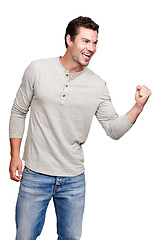 Image showing Happy, man and promotion in celebration for winning, discount or goal against a white studio background. Isolated male model winner with smile celebrating win, sale or achievement on mockup